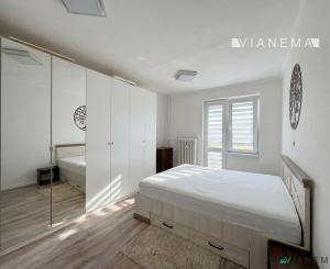 REZERVOVANÉ! Na predaj 2 izbový tehlový byt s balkónmi